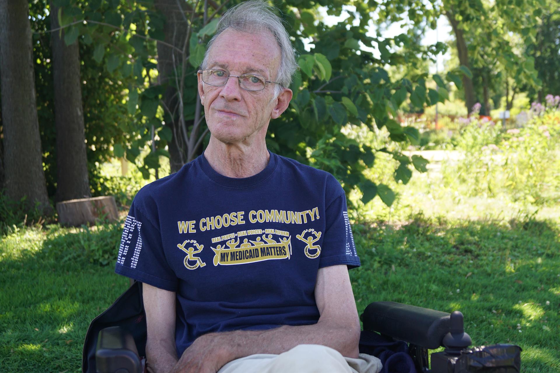 Elderly disabled man wearing a