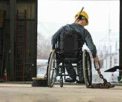 A construction worker in a wheelchair