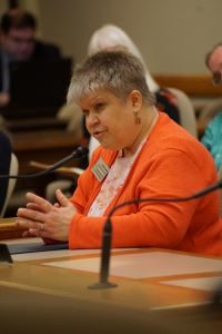Denise Jess testifying at public hearing